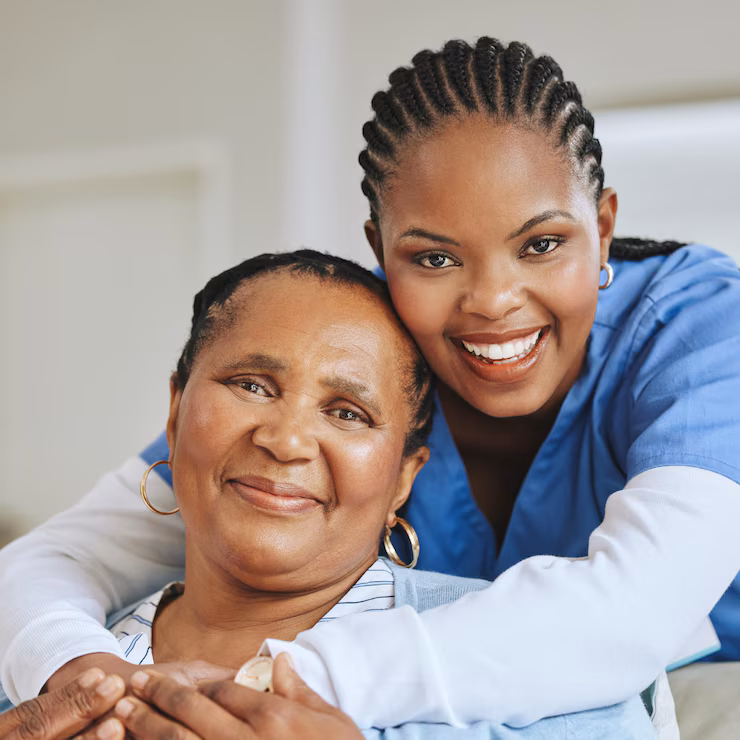 senior patient nurse woman hug portrait support healthcare happiness retirement home face black person caregiver together elderly care help health wellness 590464 185984